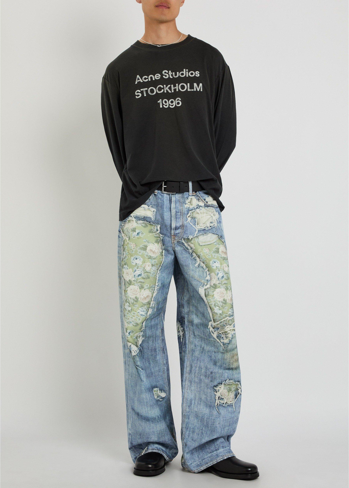 ACNE STUDIOS Distressed Wide Leg Jeans ג׳ינס רחב תכלת קרוע עם הדפס פרחוני